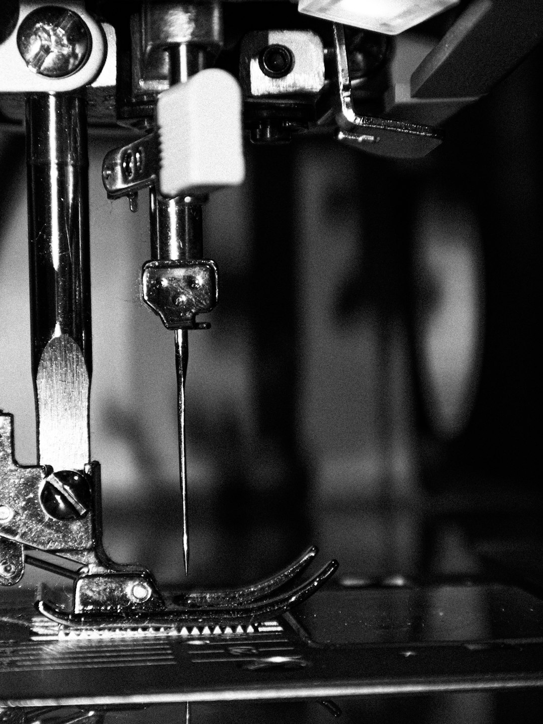 how-we-are close-up-of-a-sewing-machine-needle-and-needle-wr9b5wmfu4o